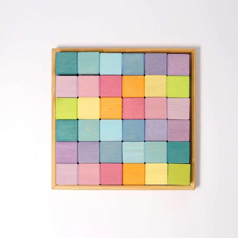 Handmade Wooden ABC Puzzle with Raised Letters for Tactile Learning ExperienceGrimm's pastel building set squares