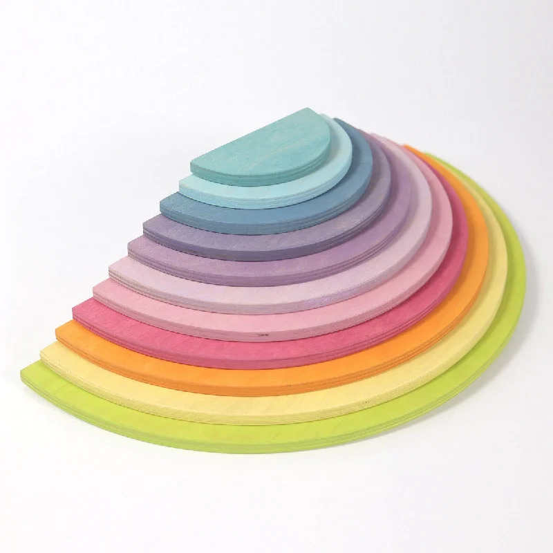 Hand - Turned Wooden Spinning Top with a Colorful Design for Classic AmusementGrimm's rainbow pastel semi circles