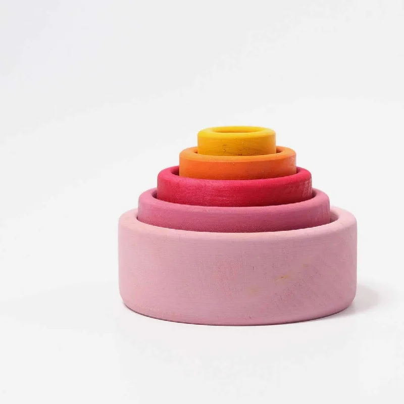 Hand - Turned Wooden Spinning Top with a Colorful Design for Classic AmusementGrimm's stacking nesting bowls lollipop pink